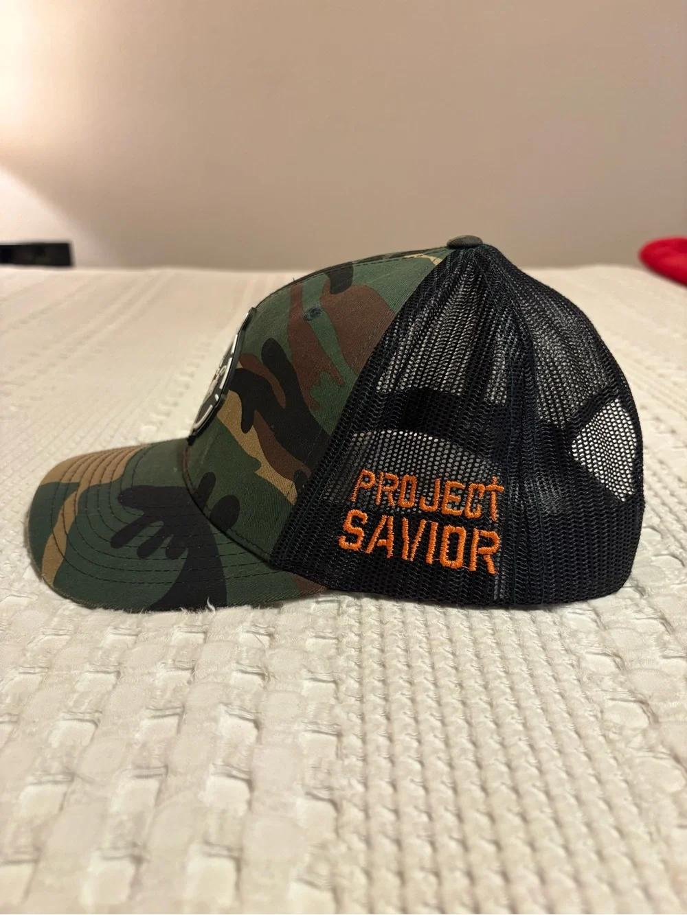 Project Savior Camo Trucker Hat with Heart Hand Patch - Green Camouflage